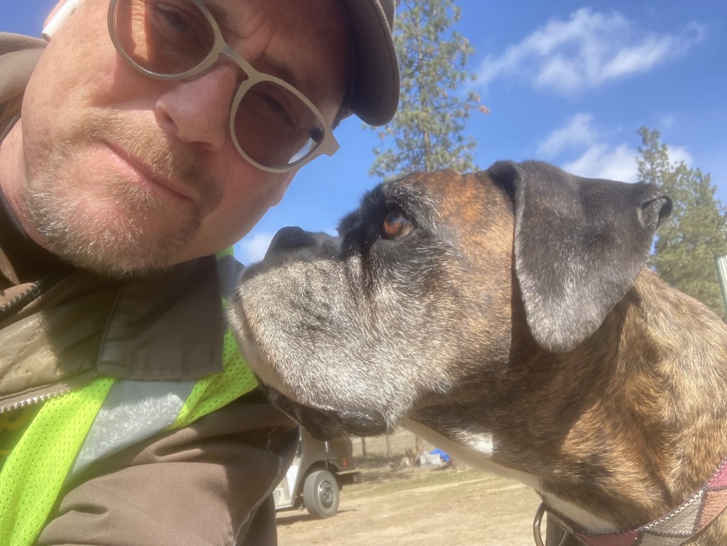 Image of Martin Hughes with his pet dog.